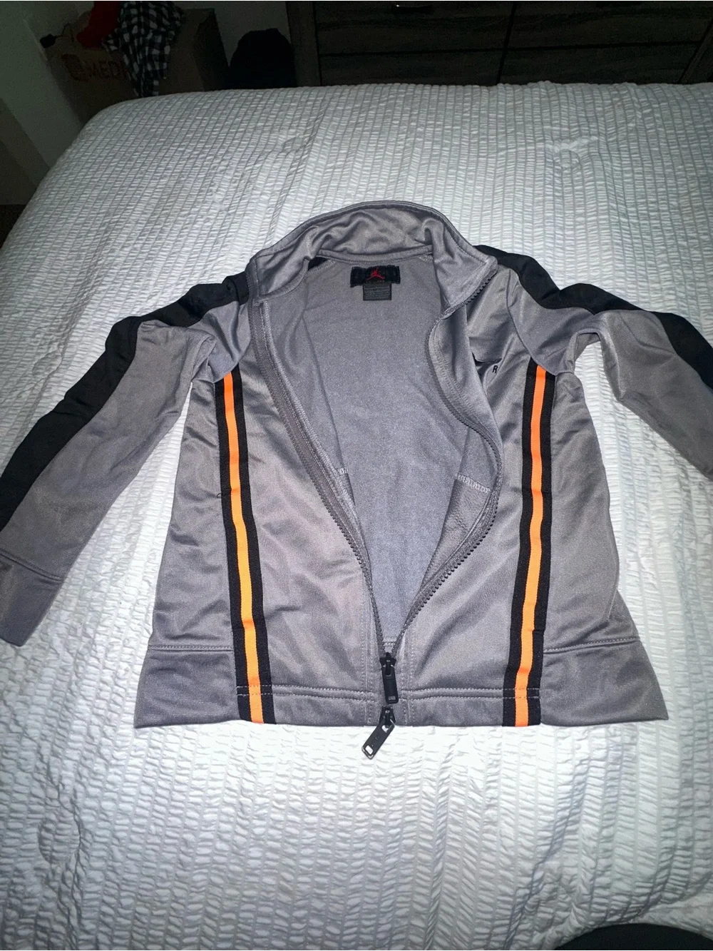 Jordan Gray Track Jacket with Orange Stripes and Black Panels